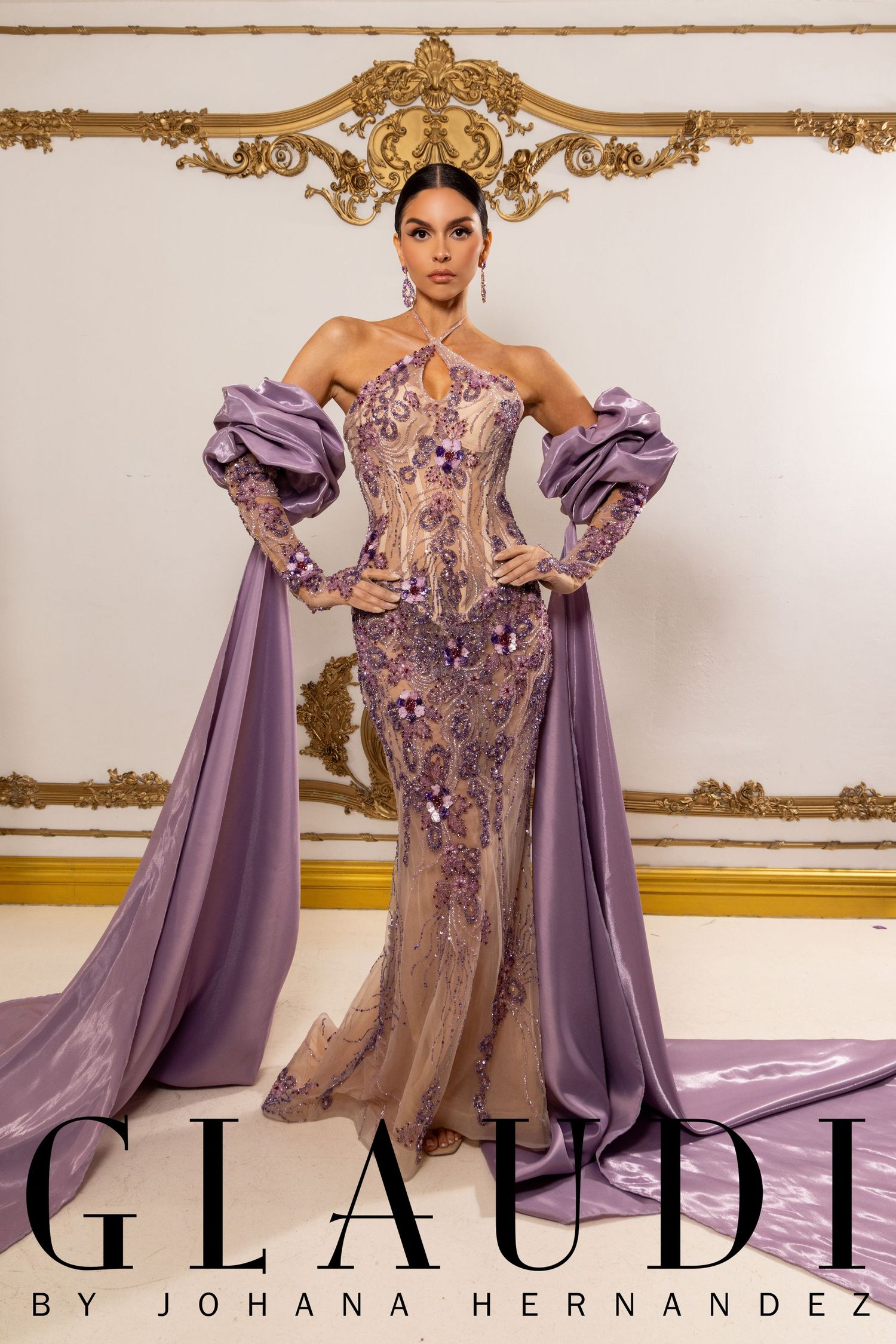 Model wearing a lavender beaded halter gown with dramatic puff sleeves by Glaudi by Johana Hernandez.