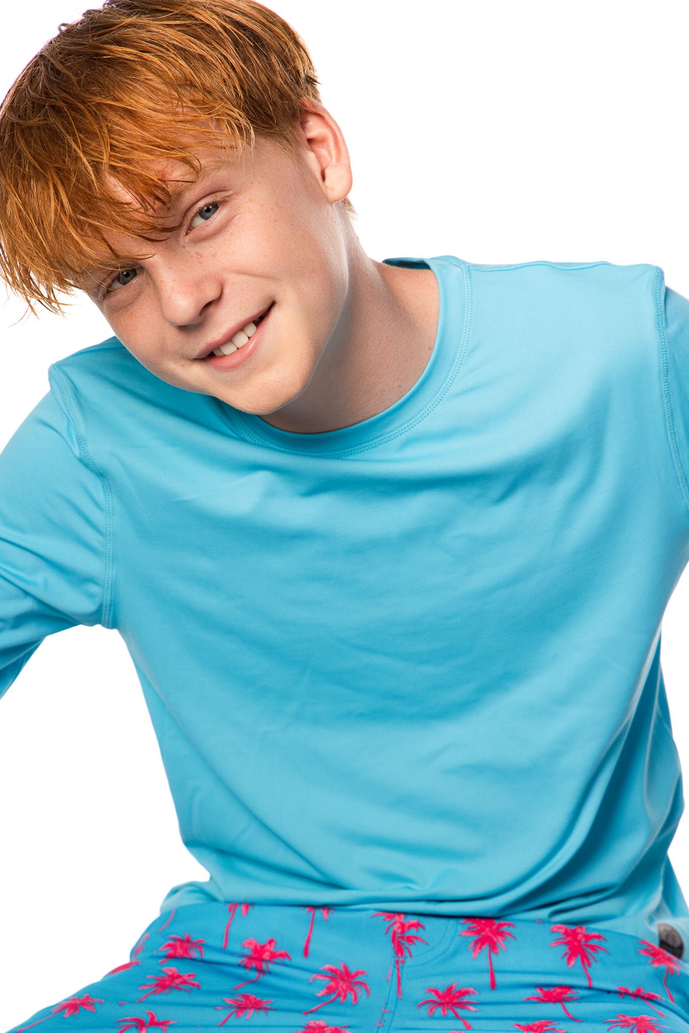 A series of photos showing someone in a bright turquoise shirt against a white background with playful expressions.
