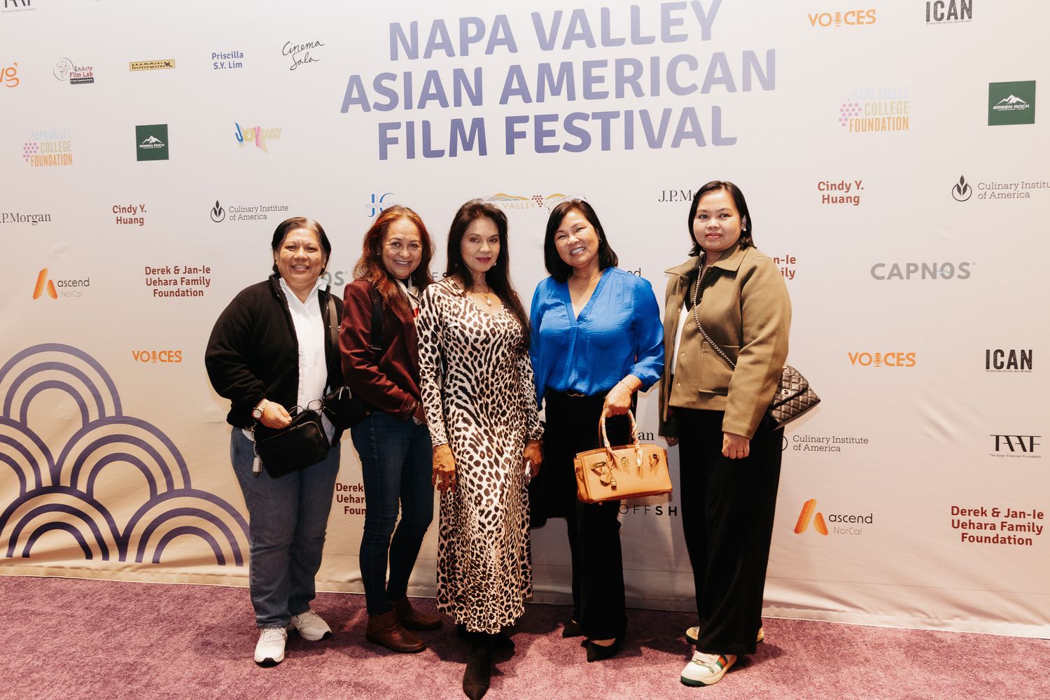 Event backdrop showing Napa Valley Asian American Film Festival branding and sponsor logos.