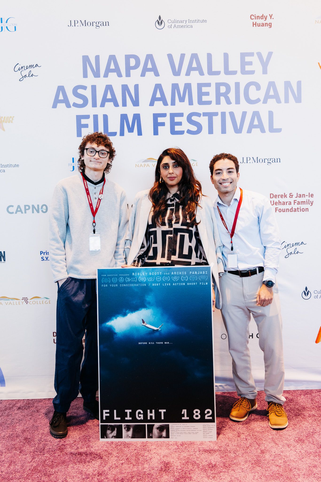 Film posters and promotional displays line the red carpet at the Napa Valley Asian American Film Festival.
