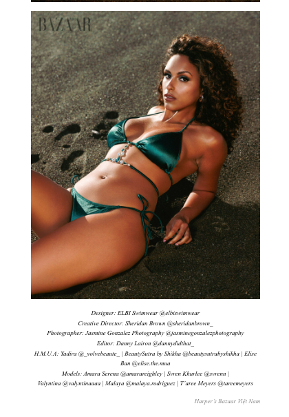 Model poses in green ELBI Swimwear bikini on sandy beach for Harper's Bazaar Viet Nam editorial shoot.