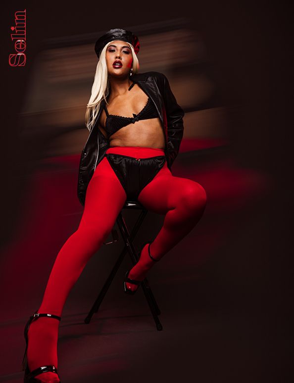 Dramatic fashion portrait series in black and red featuring latex and striking poses on dark background.