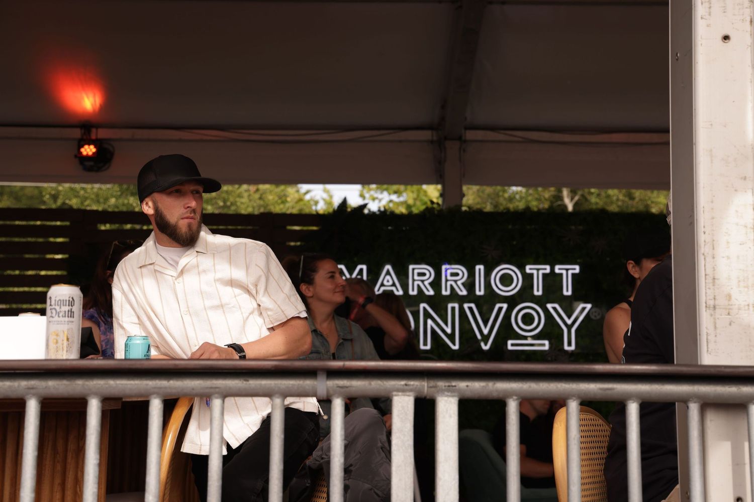 People dancing and socializing at a lively outdoor bar or restaurant venue.