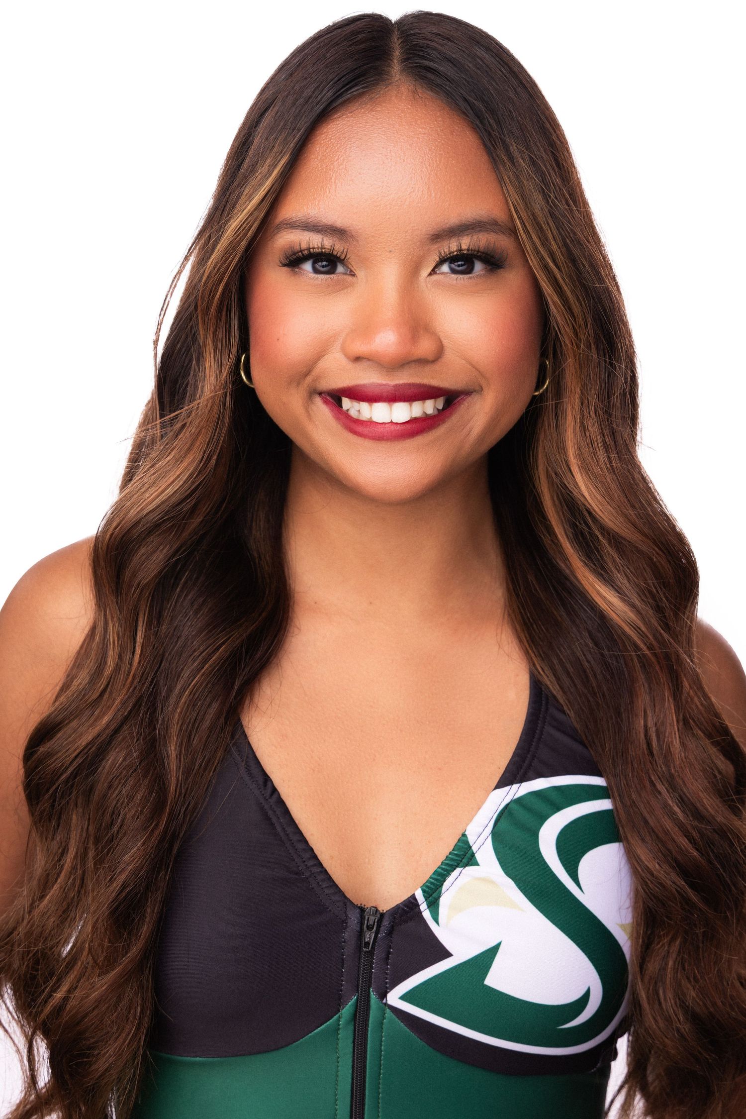 Beauty shots against white background in athletic wear with flowing brown waves.