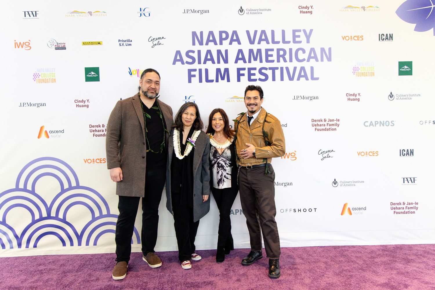 Festival attendees gather for a photo on the red carpet at the Napa Valley Asian American Film Festival.