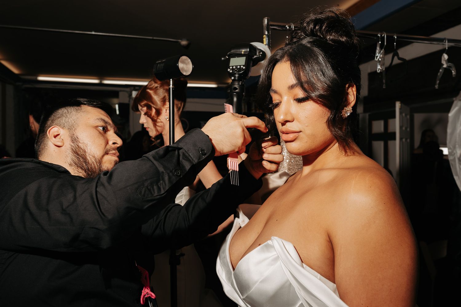 A couple shares an intimate moment during their first dance at a wedding reception.