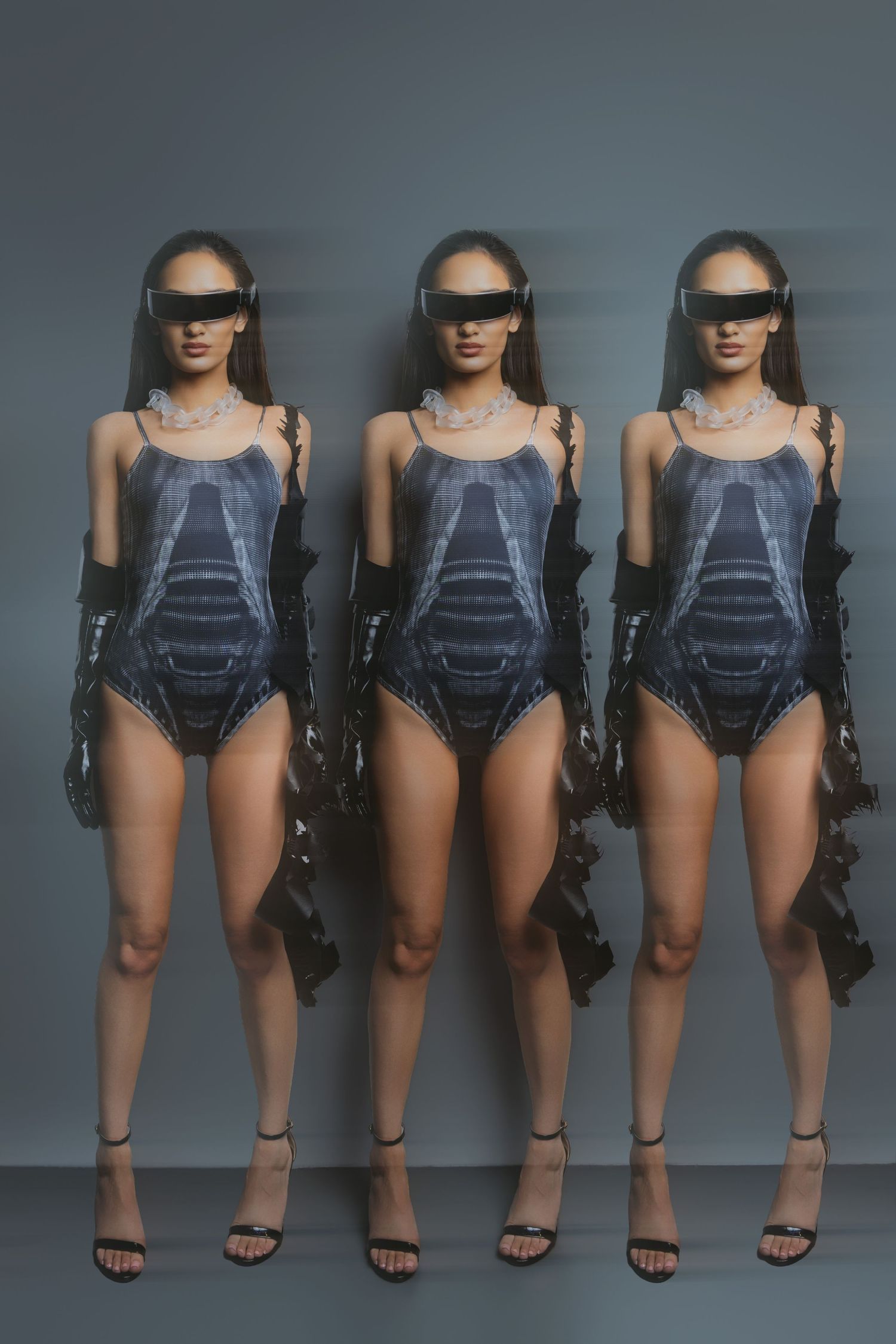 Fashion series showing metallic bodysuit with futuristic accessories in multiple poses.