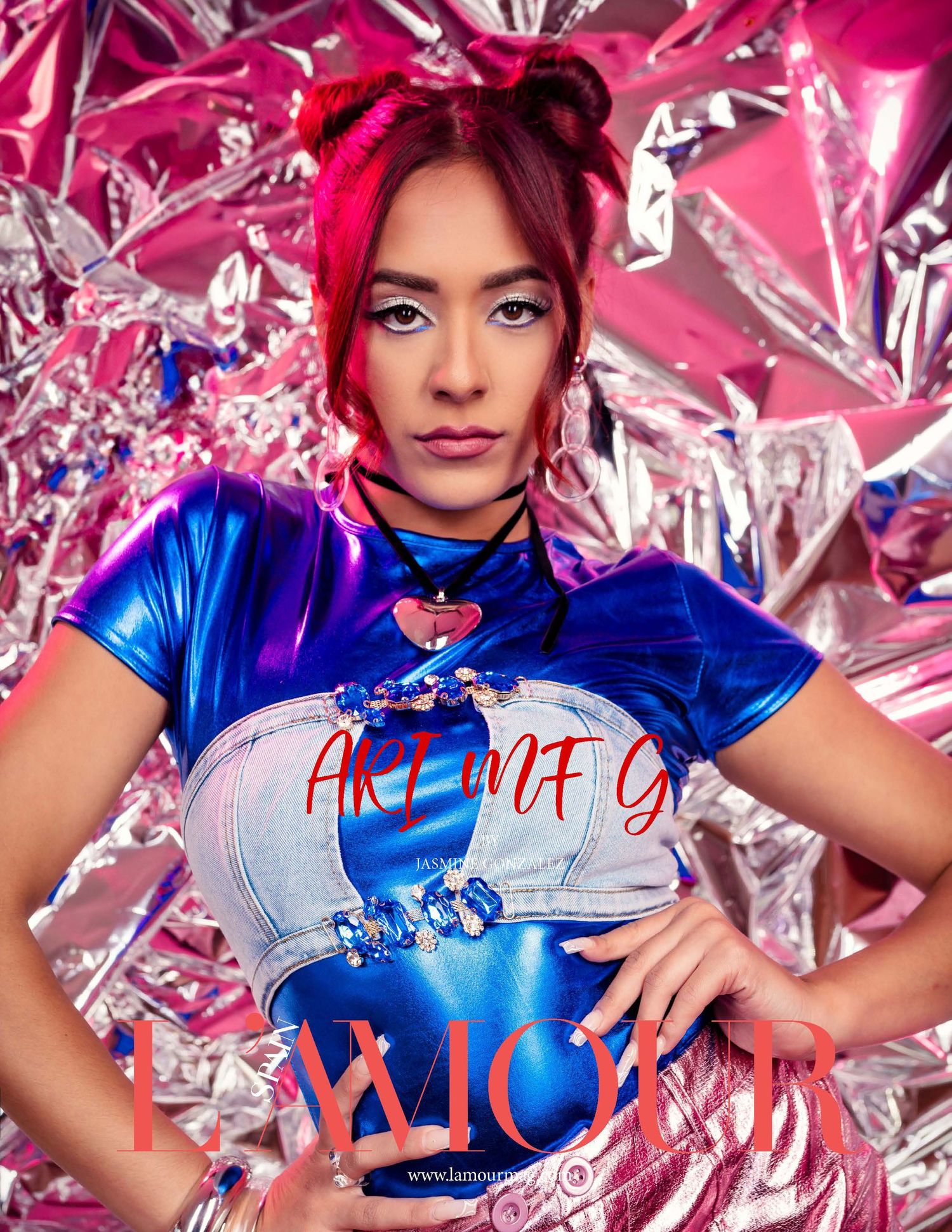 Vibrant fashion photo with blue qipao-style top against pink metallic backdrop.