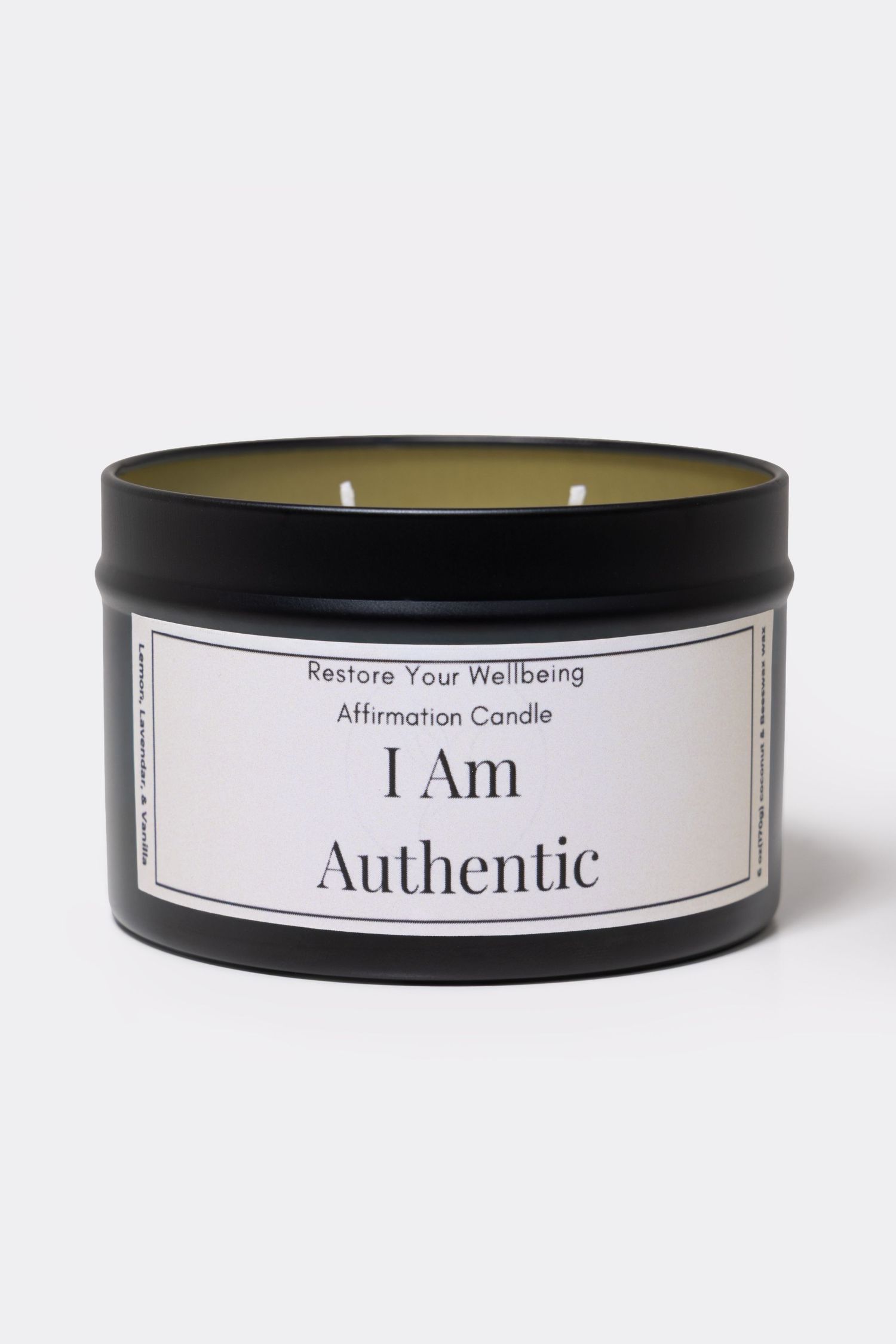 Black tin Restore Your Wellbeing Affirmation Candle labeled I Am Authentic with white label.
