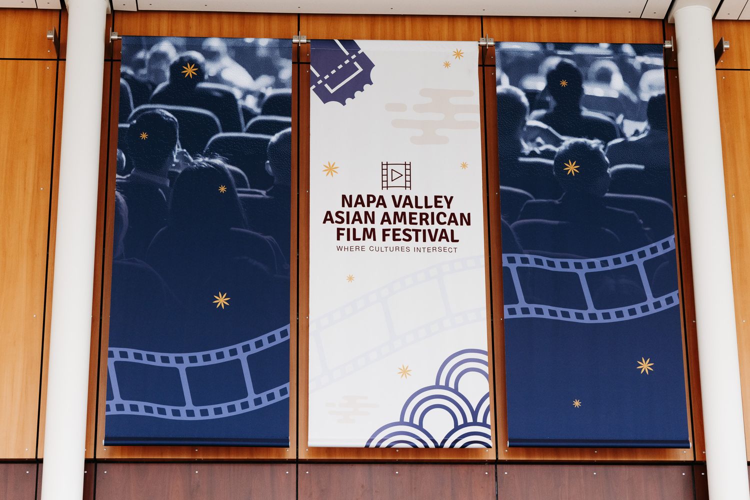 Decorative film strip banners and festival branding displayed at the Napa Valley Asian American Film Festival.