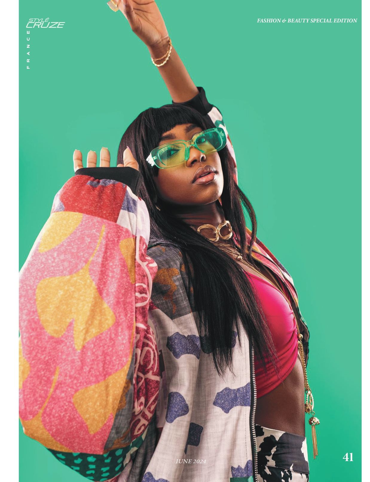 Fashion shoot against mint green background featuring colorful accessories and casual street style.