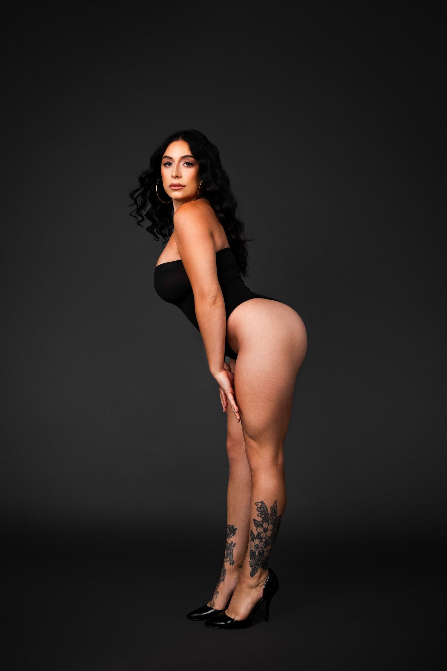 Artistic nude figure photography featuring side profile poses against dark background in multiple progressive shots.