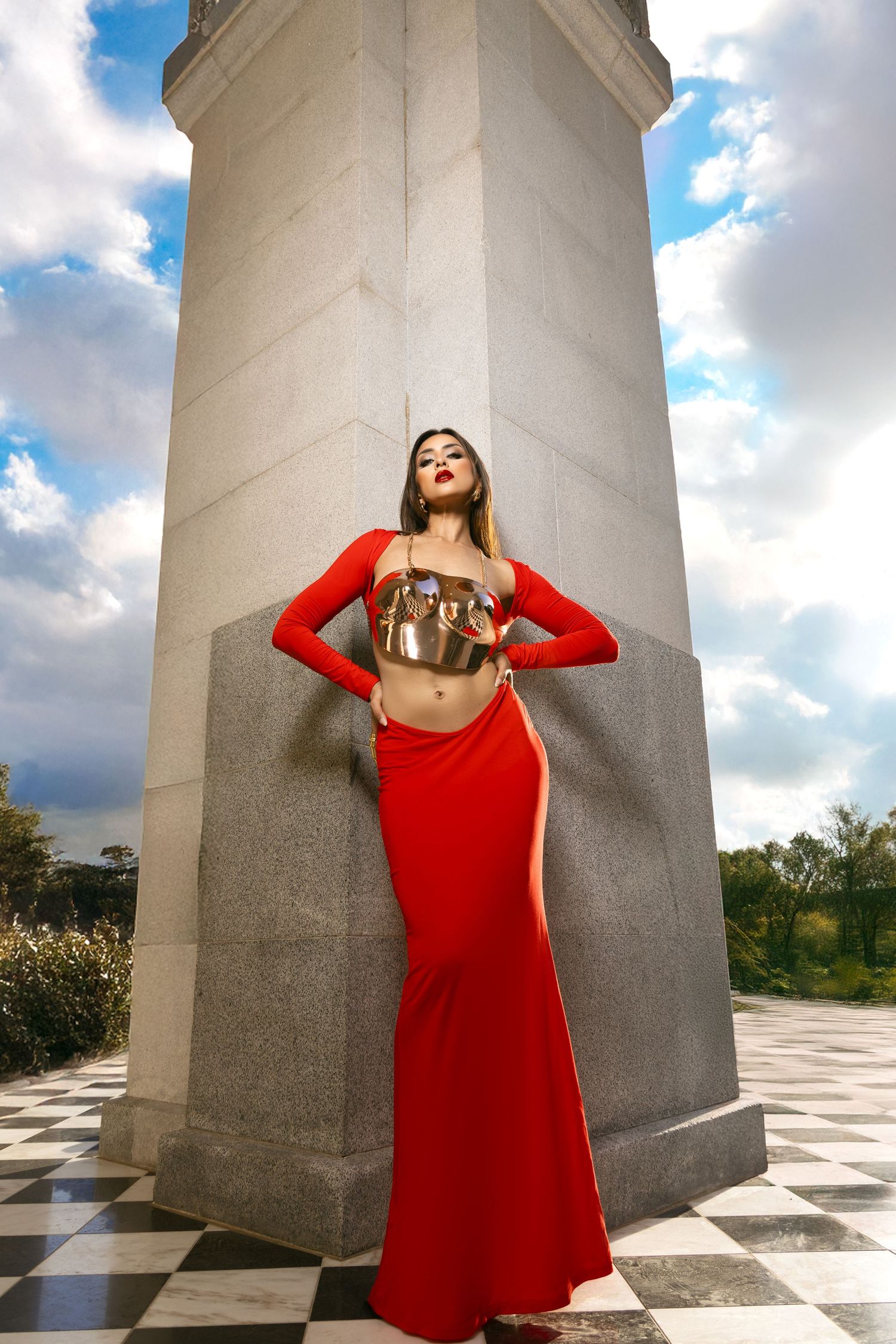 A series of photos showing someone in a red dress posing against white marble columns under a cloudy sky.