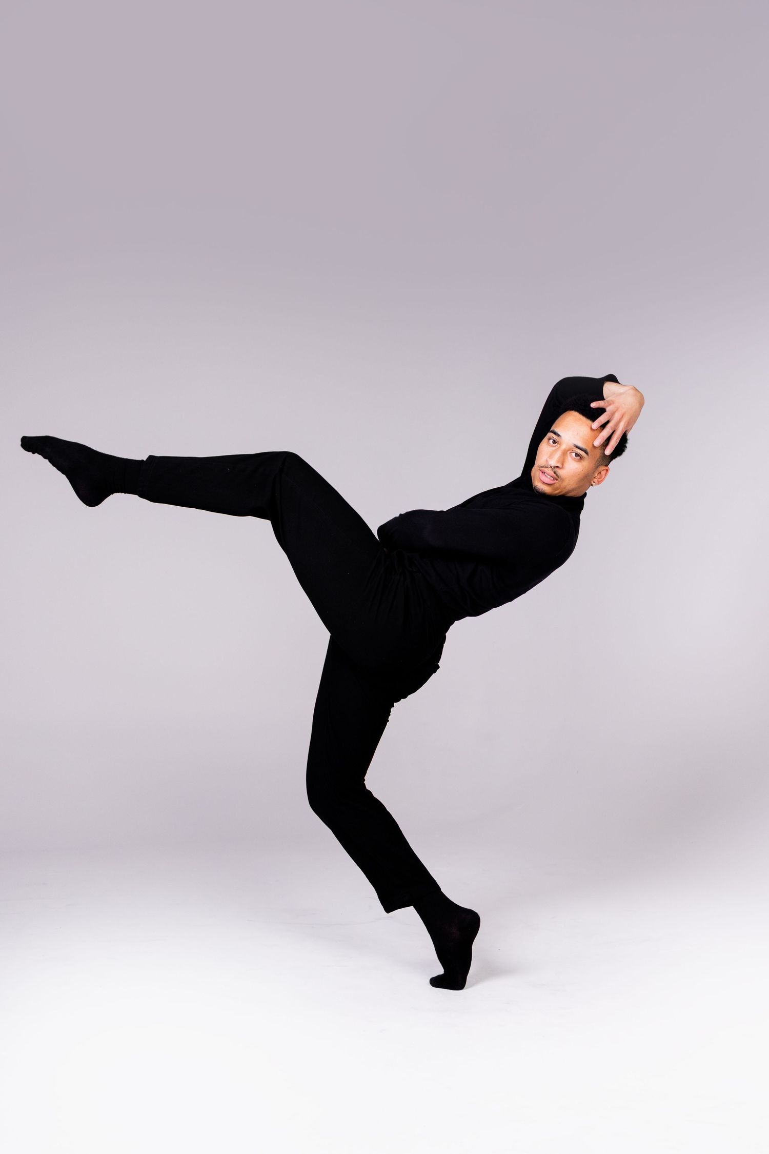 Sequence showing martial artist performing high side kick in black silhouette against light background.