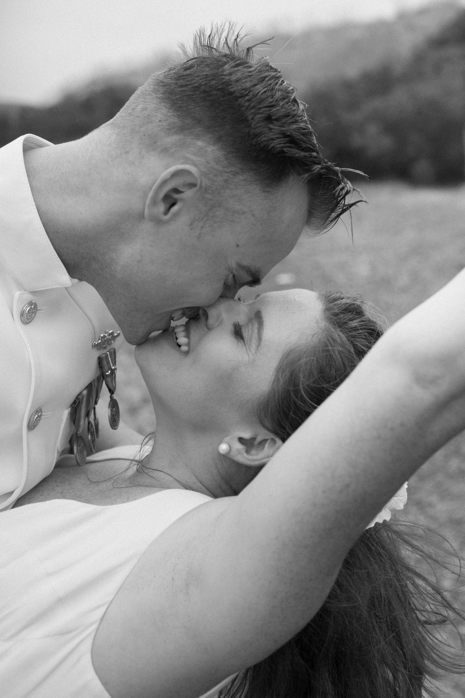 A romantic black and white photograph series showing an intimate moment between a couple.