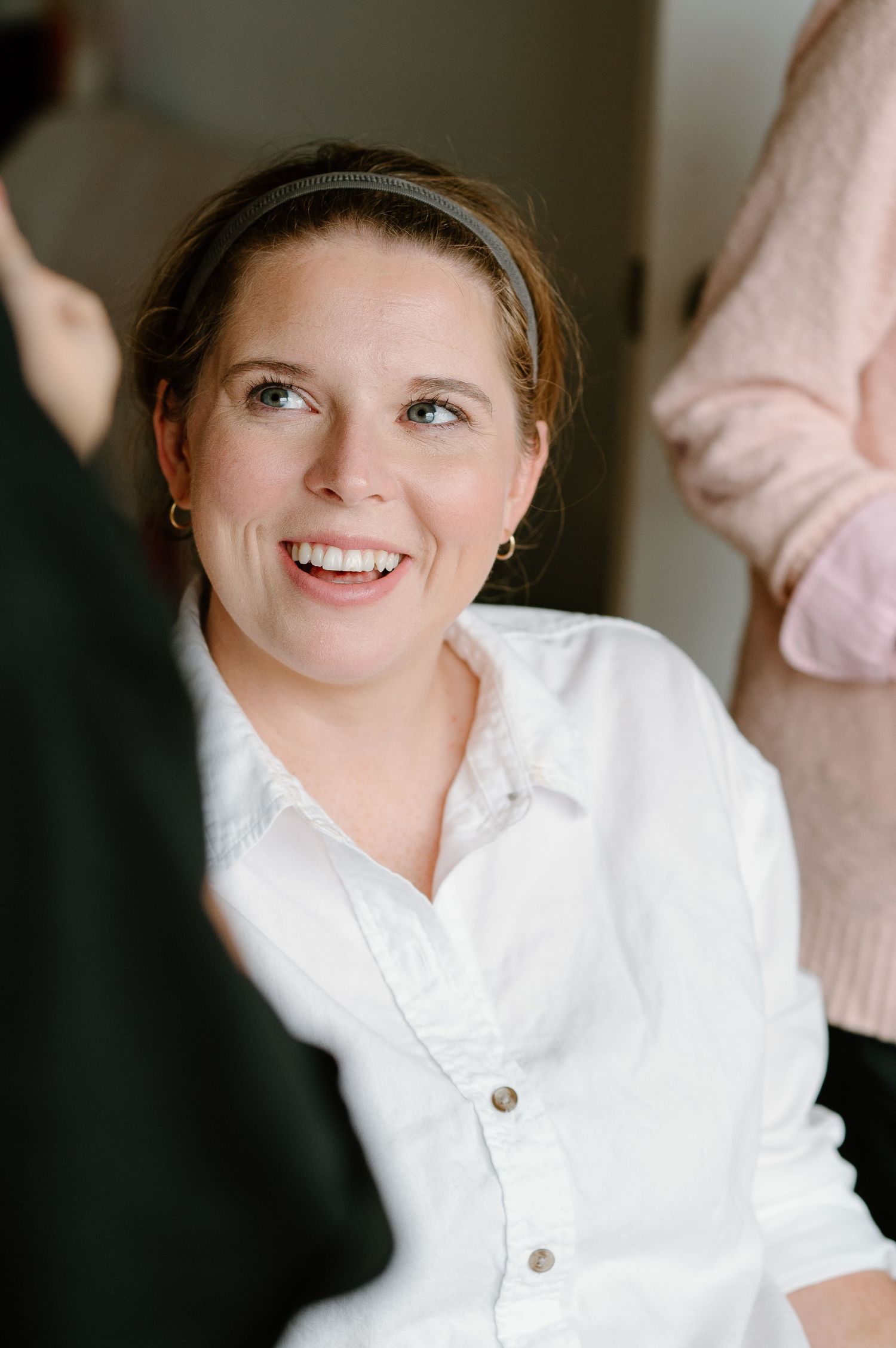 Portrait series showing genuine smiles and joyful expressions in natural light.