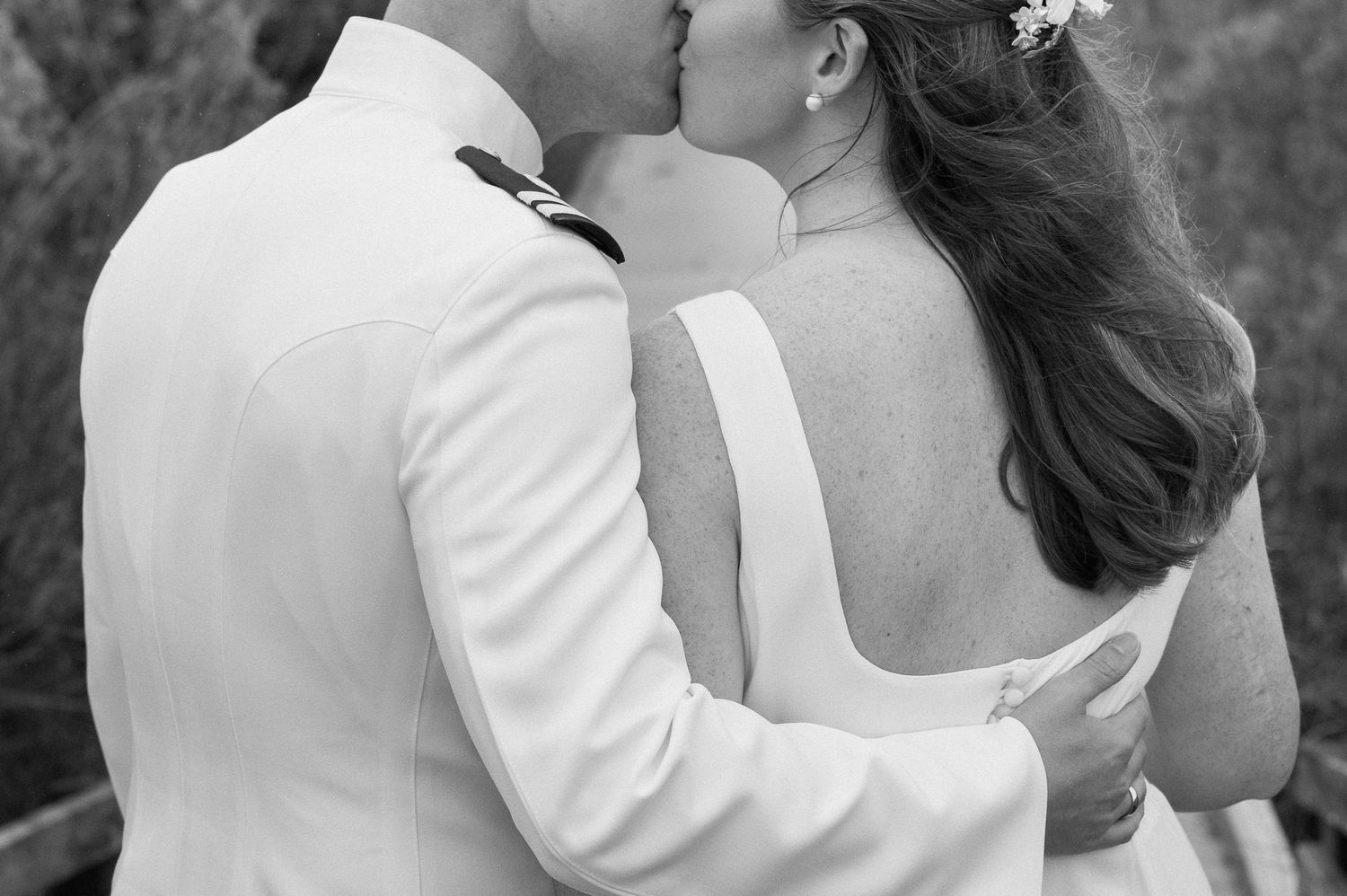 Romantic black and white photos capturing tender moments between a couple.
