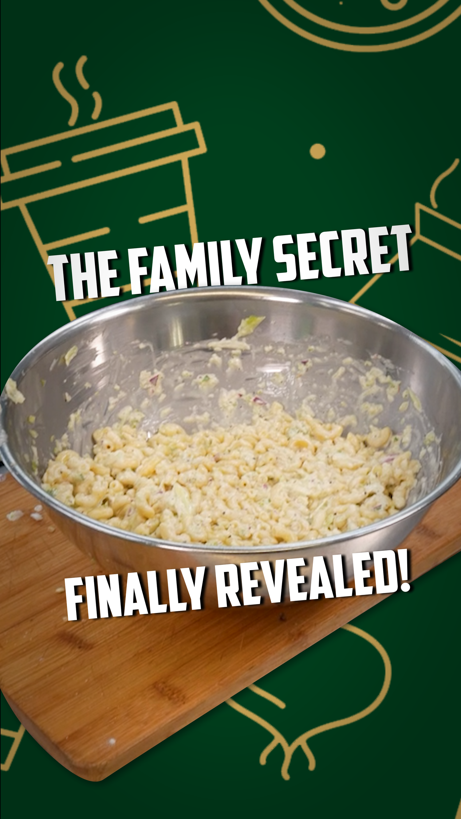 A stainless steel bowl filled with creamy macaroni salad on a wooden cutting board with a green background.