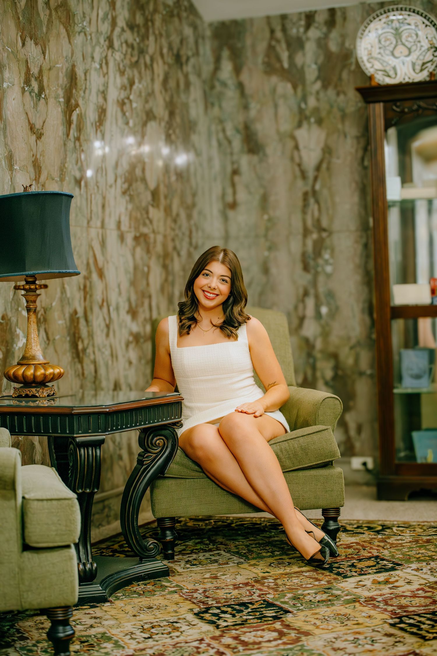 A series of vintage-style photos showing someone lounging on a green sofa against a textured wallpaper background.