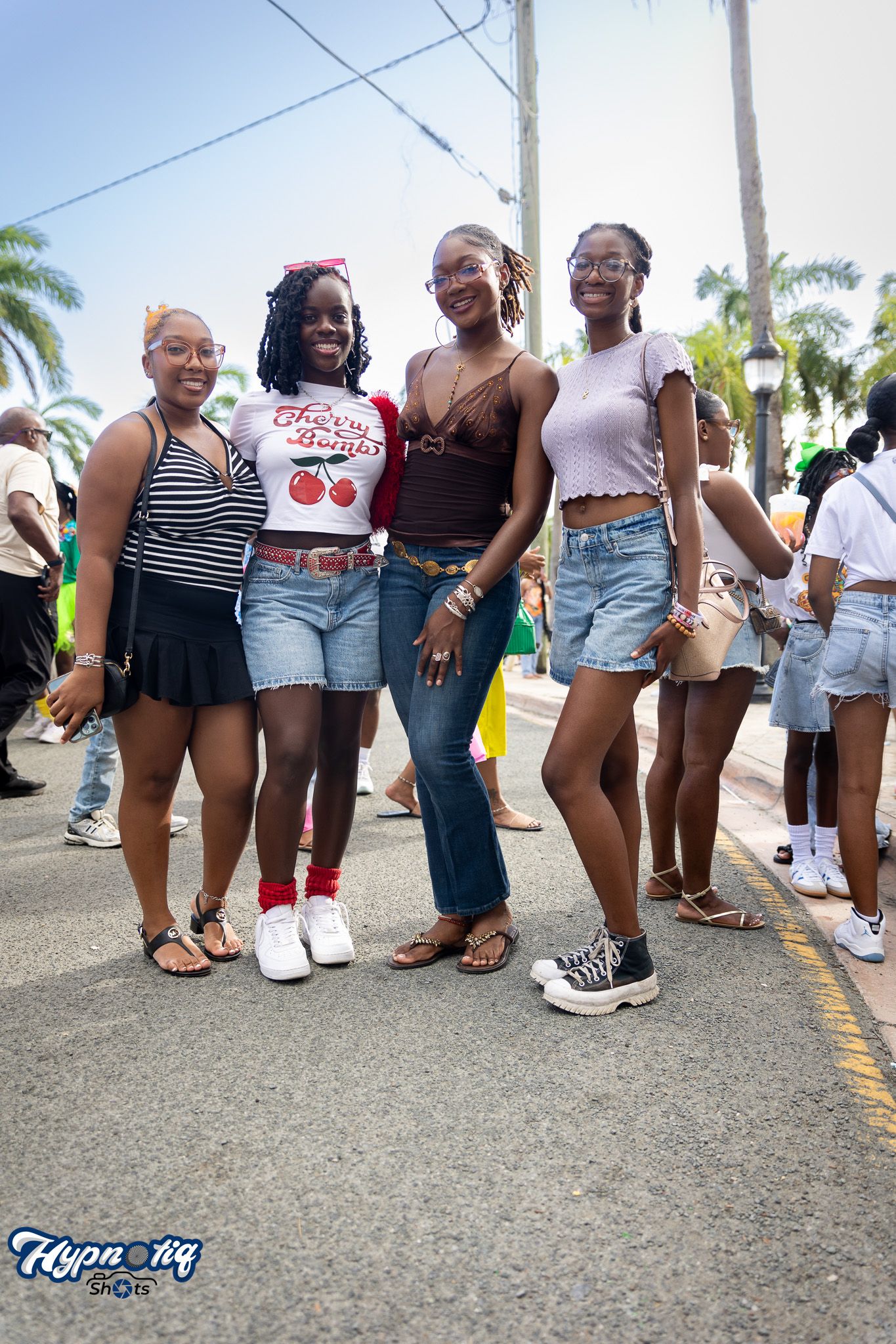 Group photo focused on casual summer outfits and denim shorts.