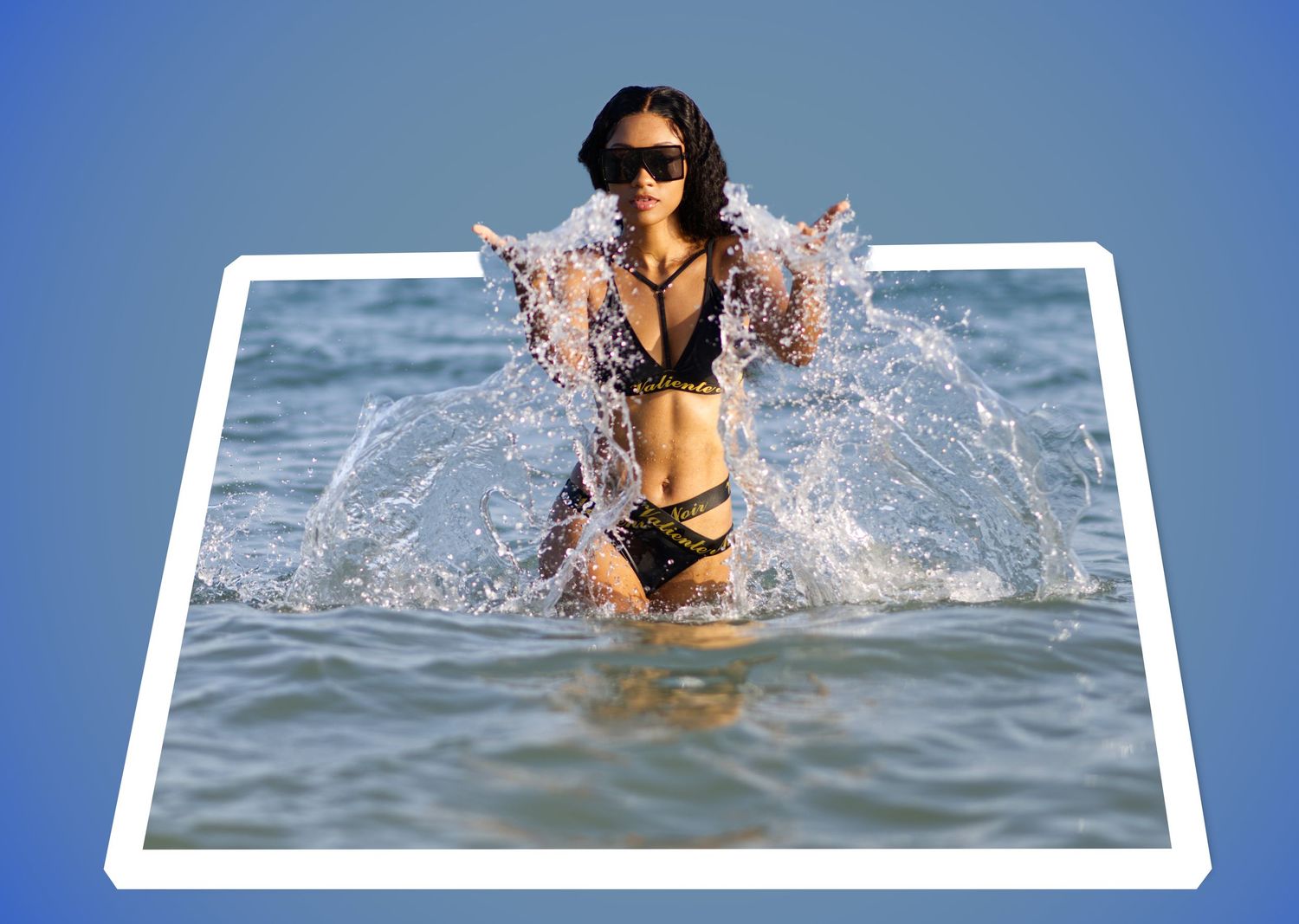 Splashing water creates dynamic patterns against a bright blue ocean background.