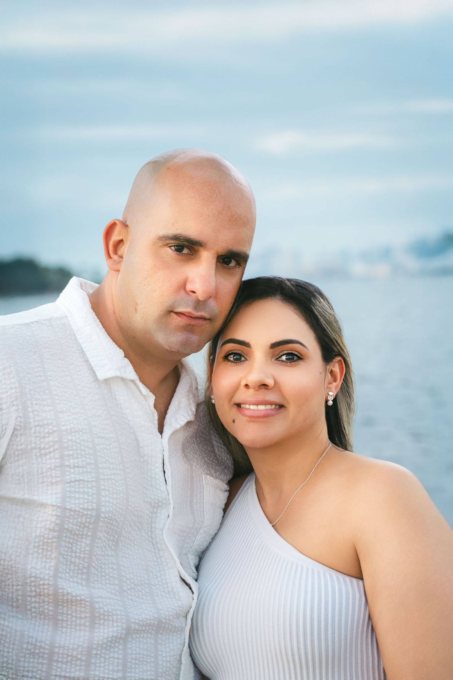 Couples portrait at the beach in natural light.