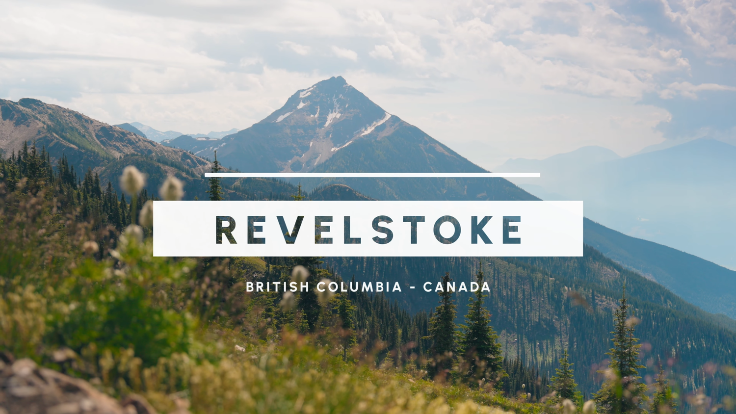 Mountain landscape view of Revelstoke, British Columbia with text overlay against scenic peaks and forest backdrop.