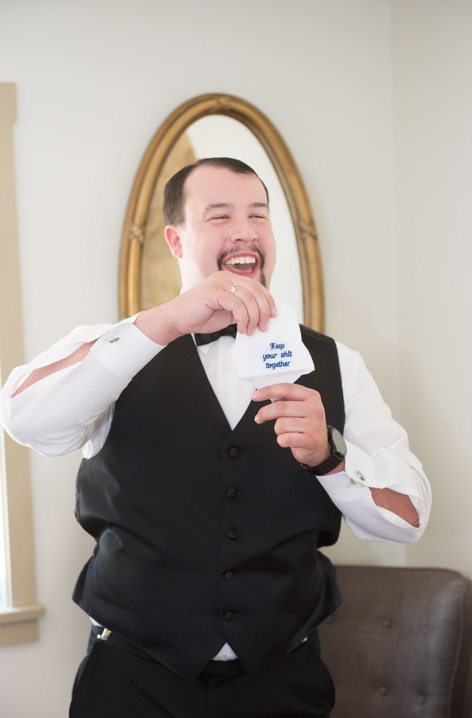 A wedding venue with connected photos showing sequential reactions to wiping a face with a white napkin.