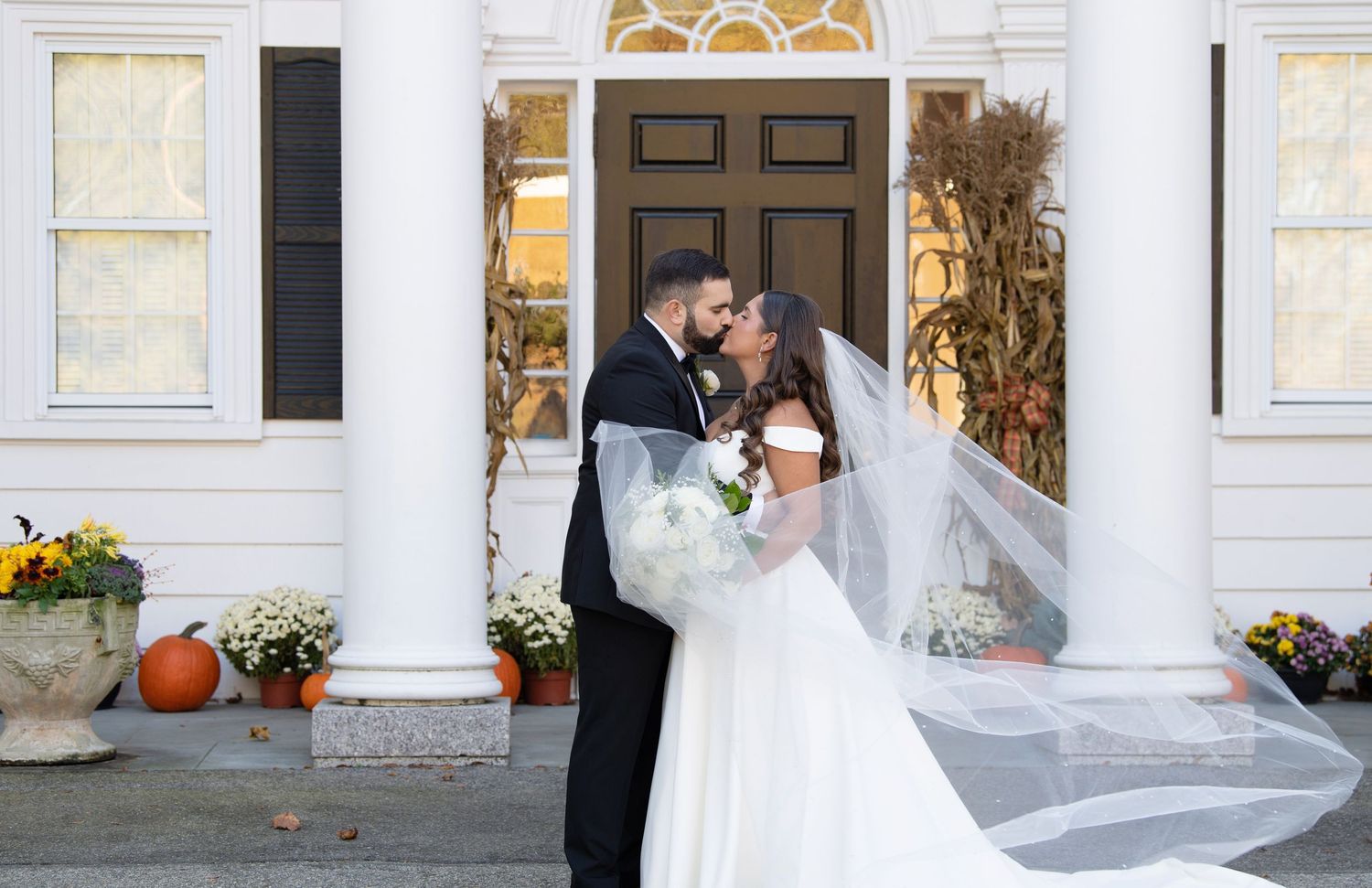 A series of wedding photos showing a couple in formal attire against a white columned building entrance.