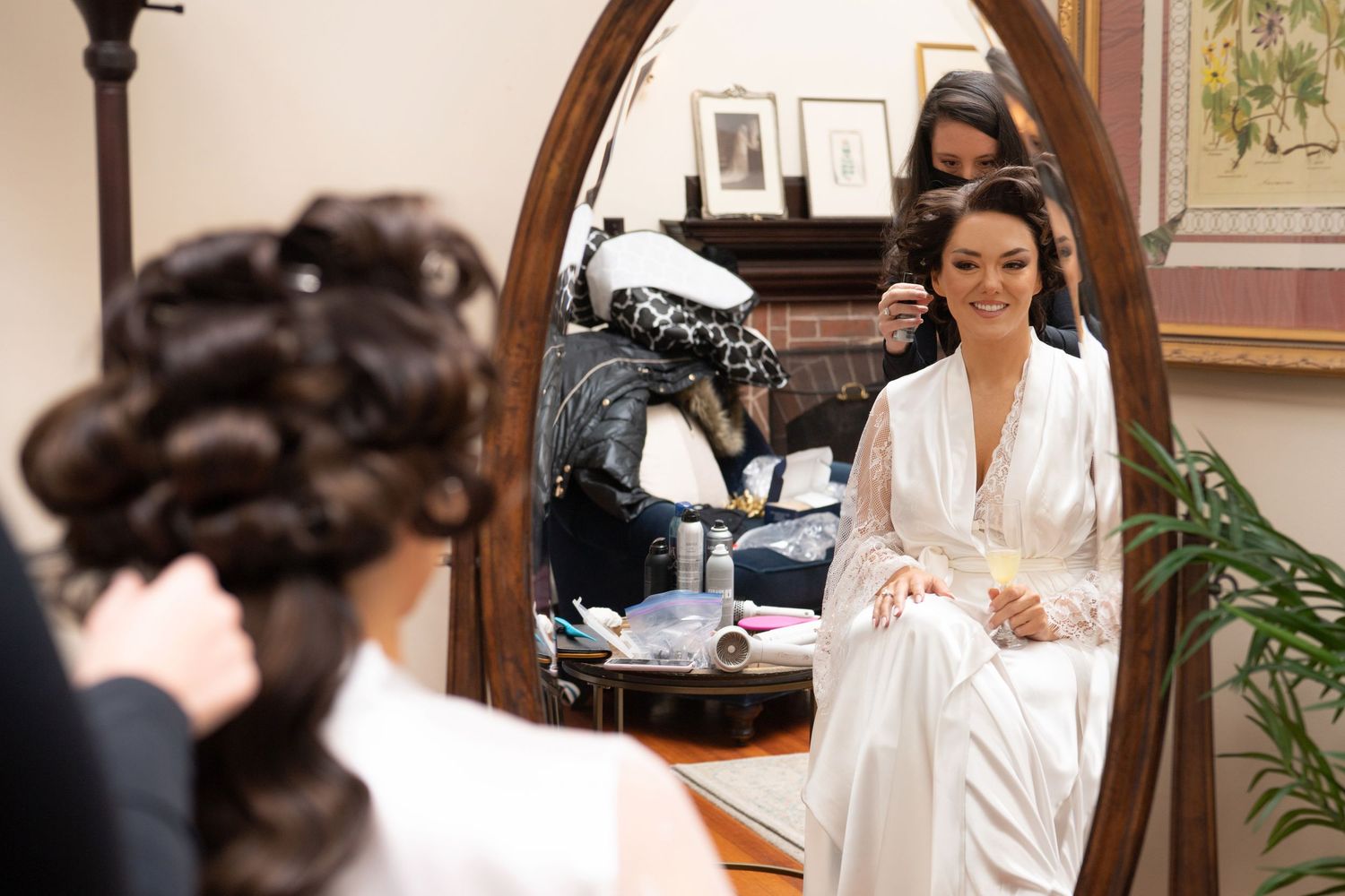 A woman in a white robe gets pampered at a luxury spa while receiving beauty treatments and relaxing massages.