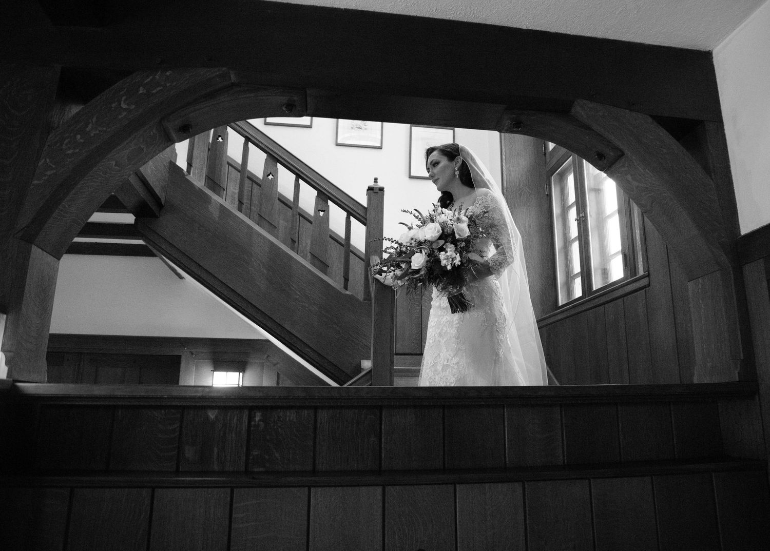 Black and white architectural photographs showing dramatic staircase angles and shadows.