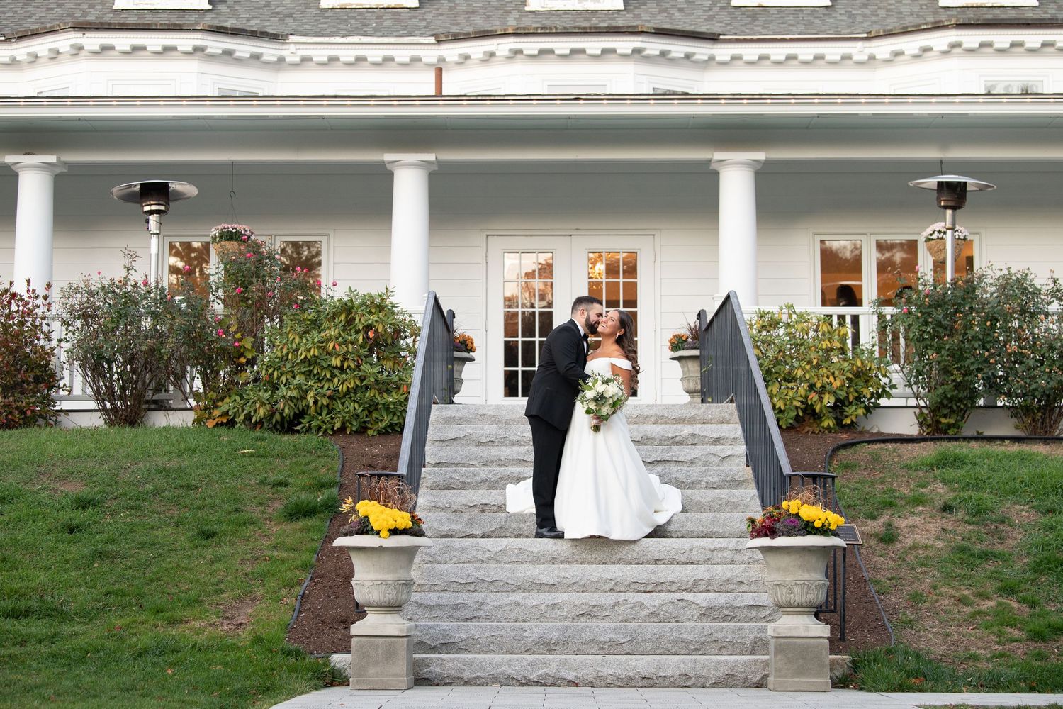 A series of outdoor wedding ceremony photos showing white columns and steps decorated with yellow flowers and greenery.