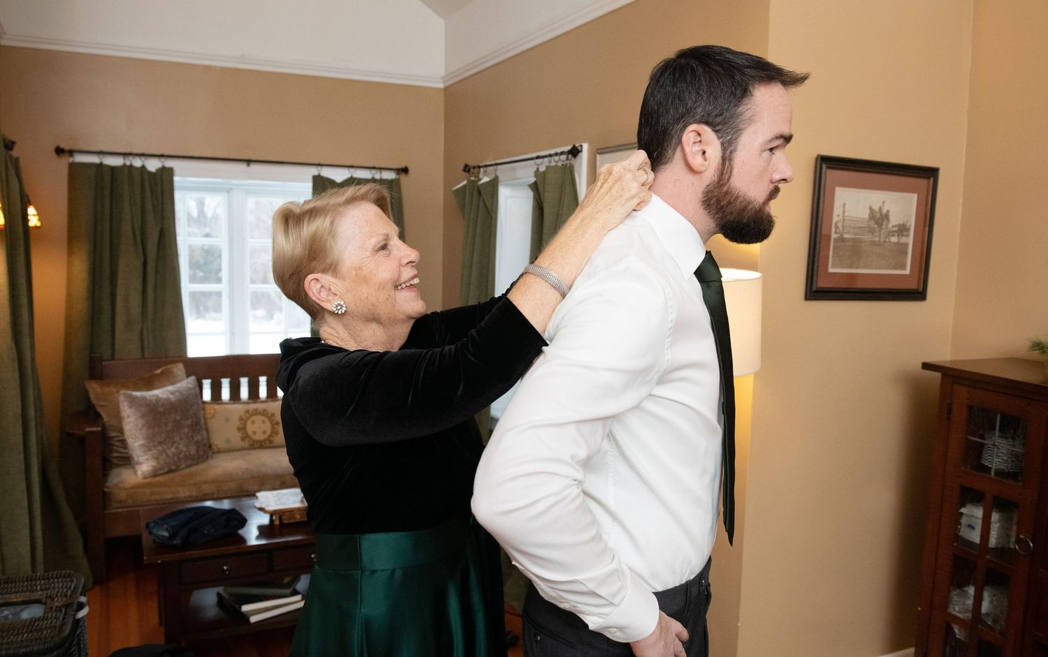 A series of candid moments showing people embracing and interacting in an indoor home setting.