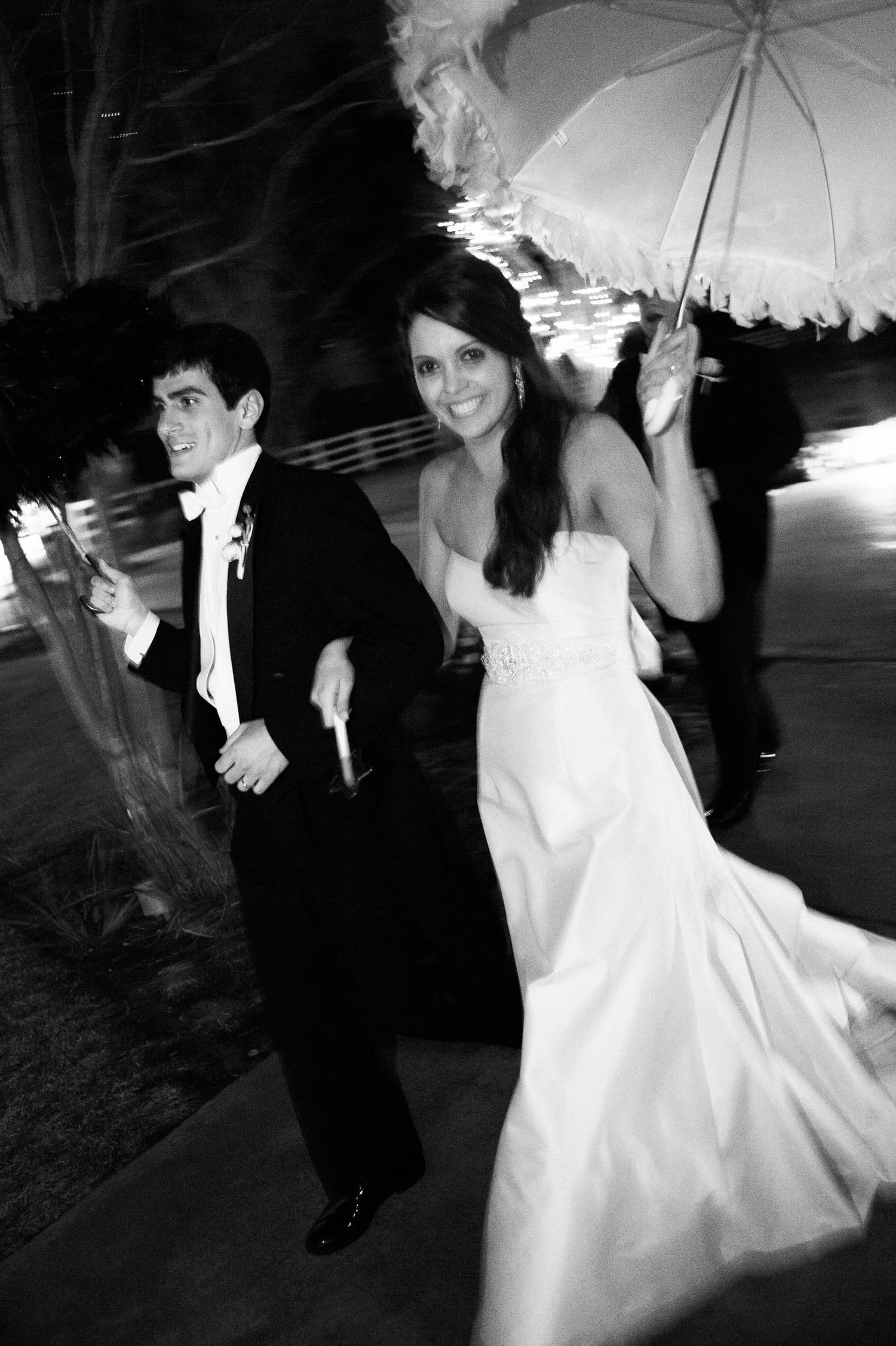 A black and white photo sequence shows a couple dancing at a wedding reception, with the bride's dress swirling in motion.