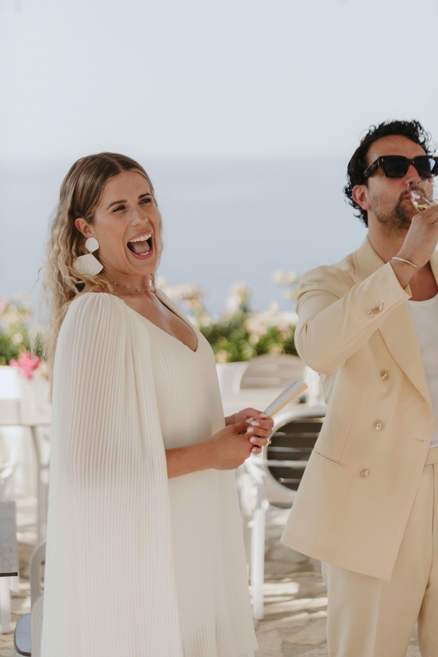 A sequence of candid moments showing someone in a cream-colored outfit drinking and laughing at an outdoor event.