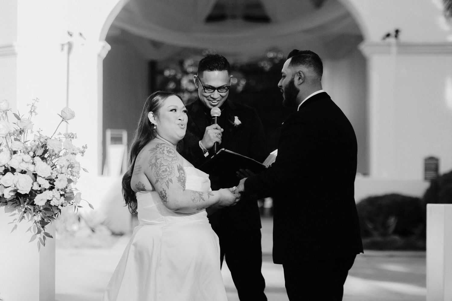 A series of black and white wedding photos showing emotional moments between couples during their first dance.