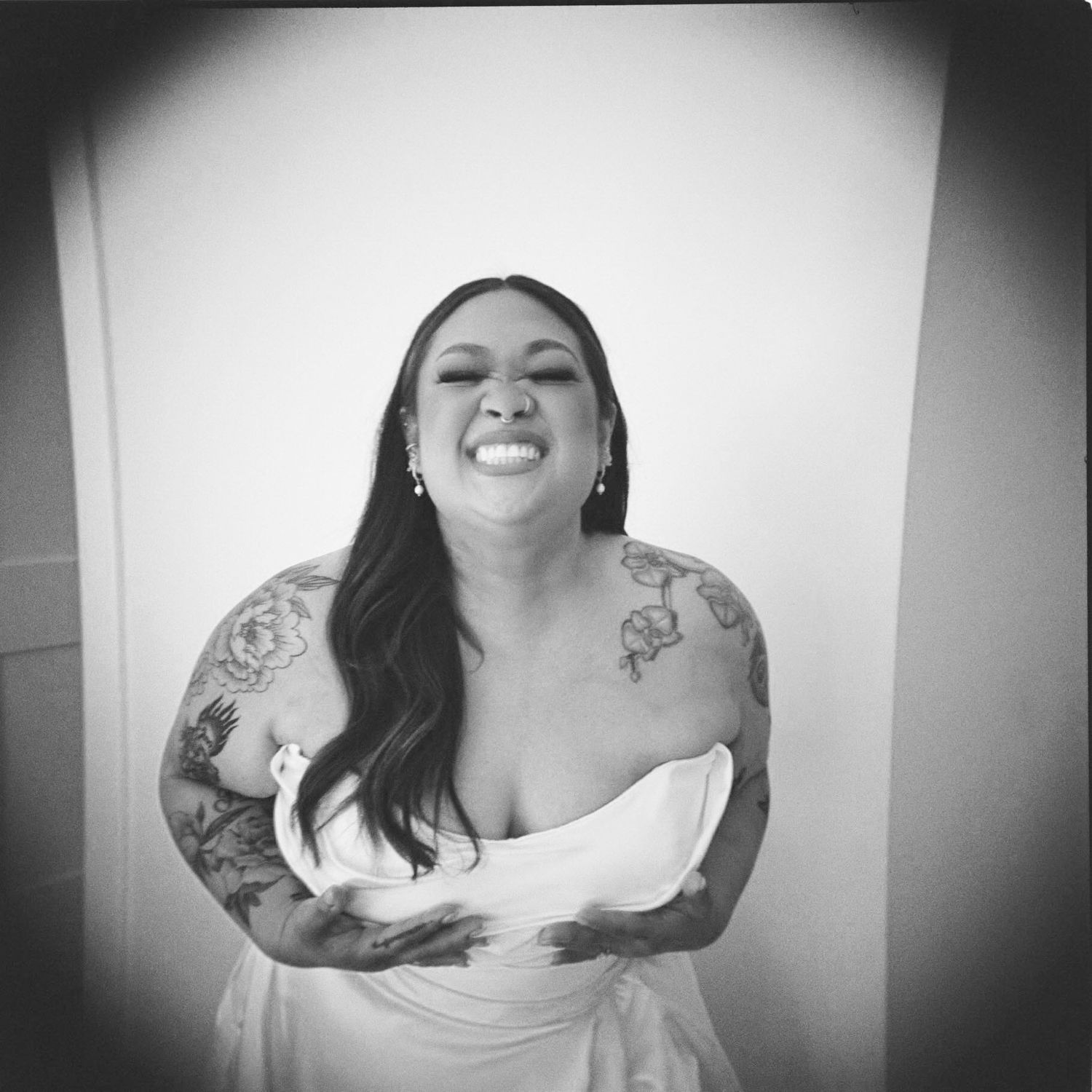 Black and white photo series showing a person in a white top smiling and posing against a light background.