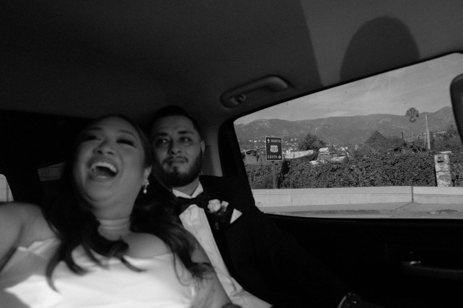 A collection of seven black and white photographs arranged in a horizontal row showing various candid moments and scenes.