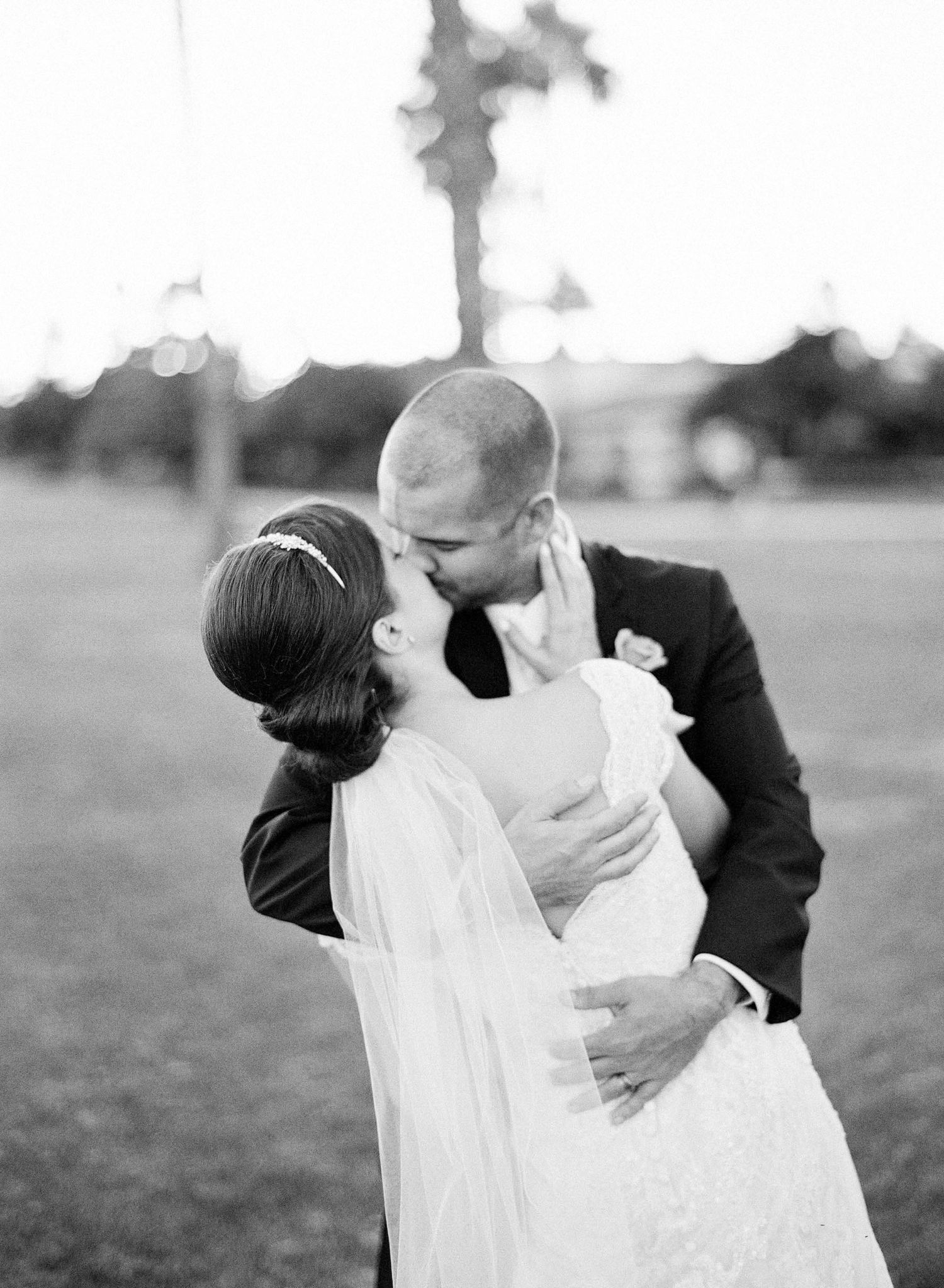 A romantic black and white wedding photo sequence shows a couple dipping and embracing in an outdoor setting.