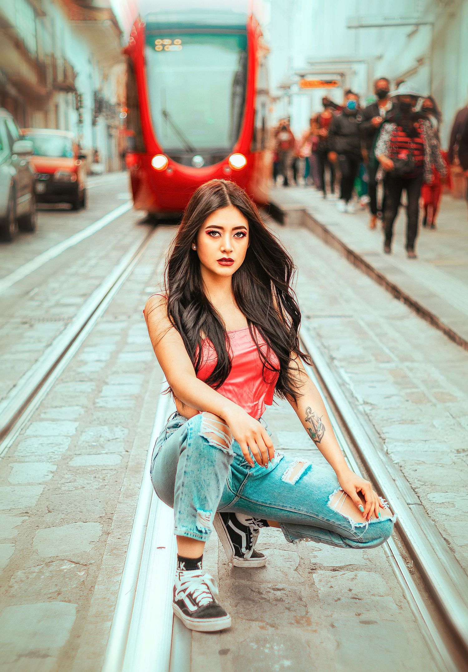 Street photography series along train tracks with teal and red color grading.