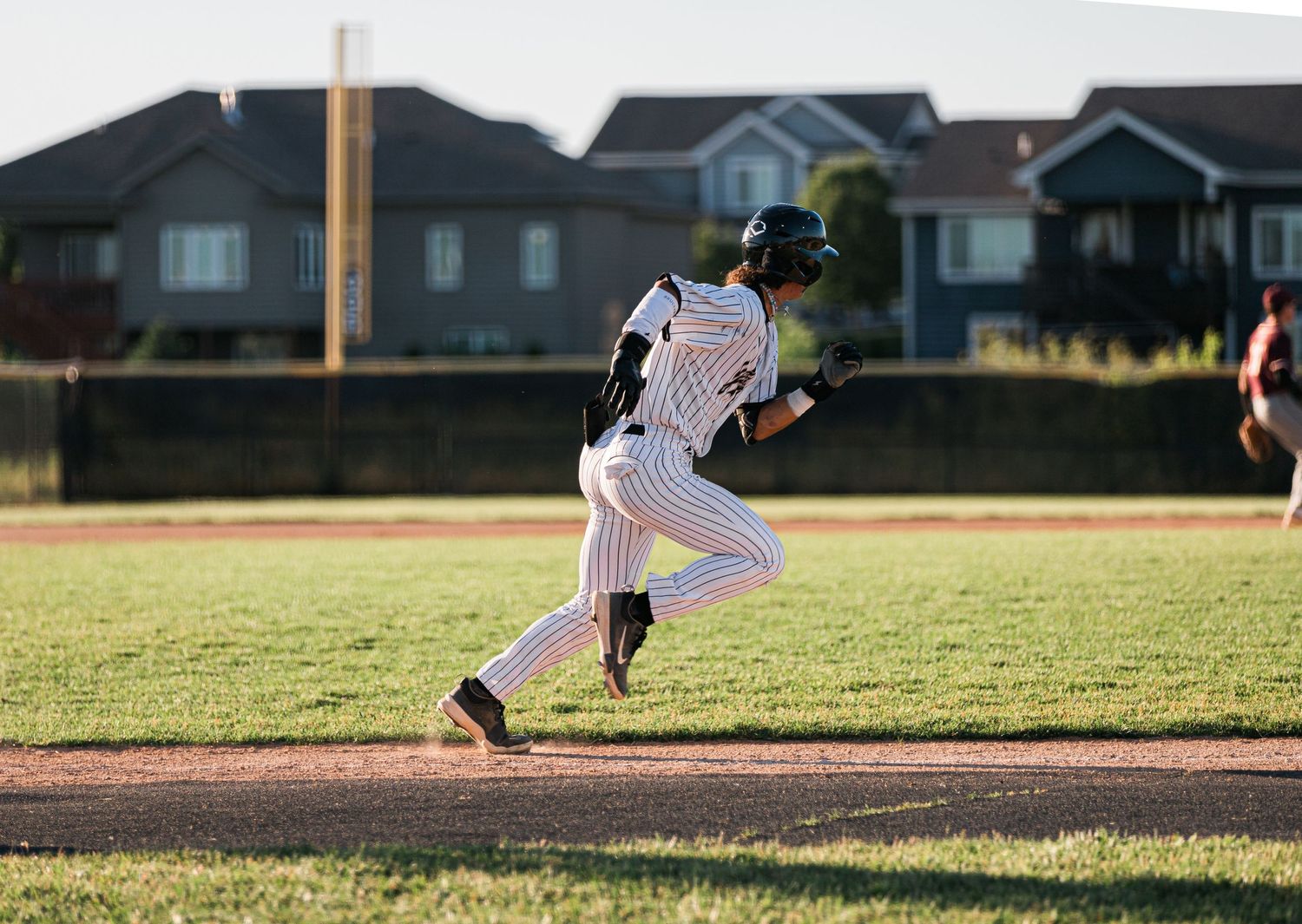 Ankeny Centennial Jaguars baseball team in action during a home game in Ankeny, Iowa