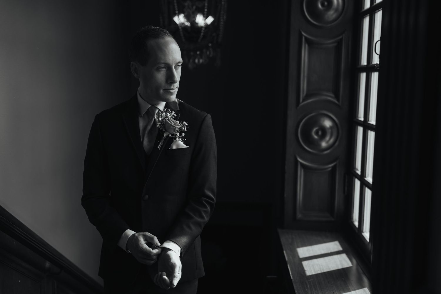 A dramatic black and white photo sequence shows someone smoking in a dimly lit room by a window.
