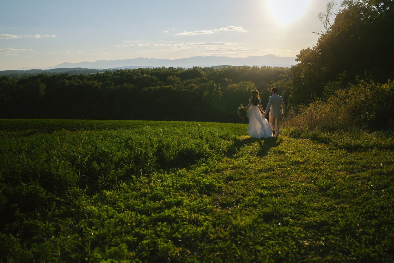 The Barn at Liberty Farms Lara and Nick Running down the hill