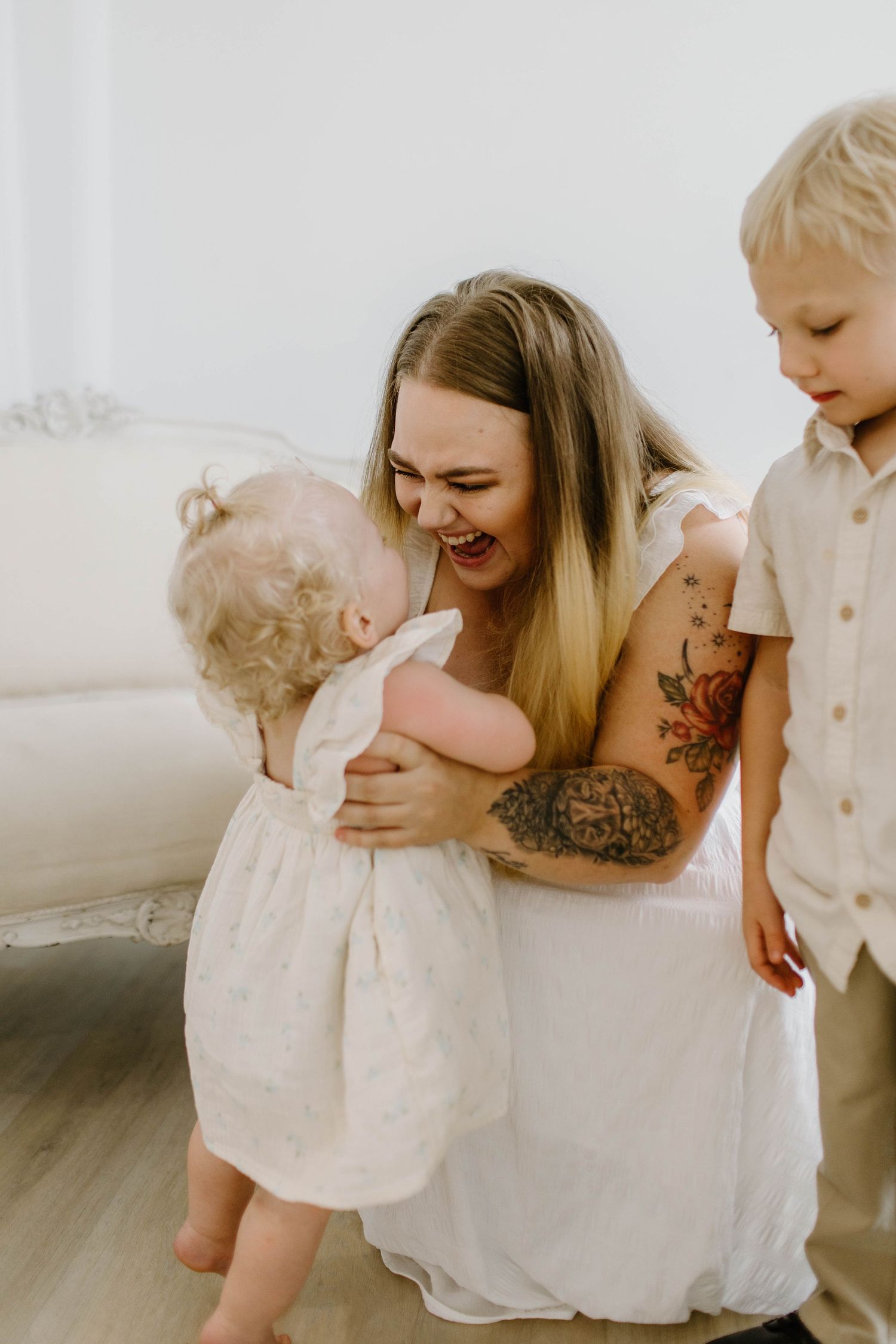 A loving moment captured in a series of candid photographs showing tender interaction between family members.