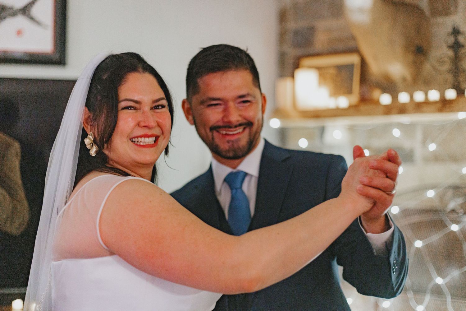 Couple shares intimate dance moments during their wedding celebration.