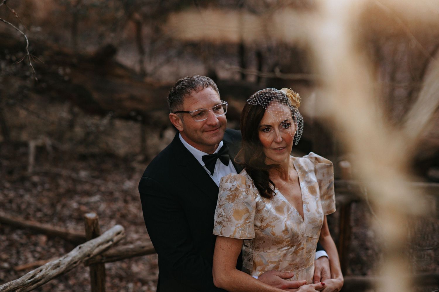 Romantic outdoor wedding portraits with soft lighting and natural scenery.