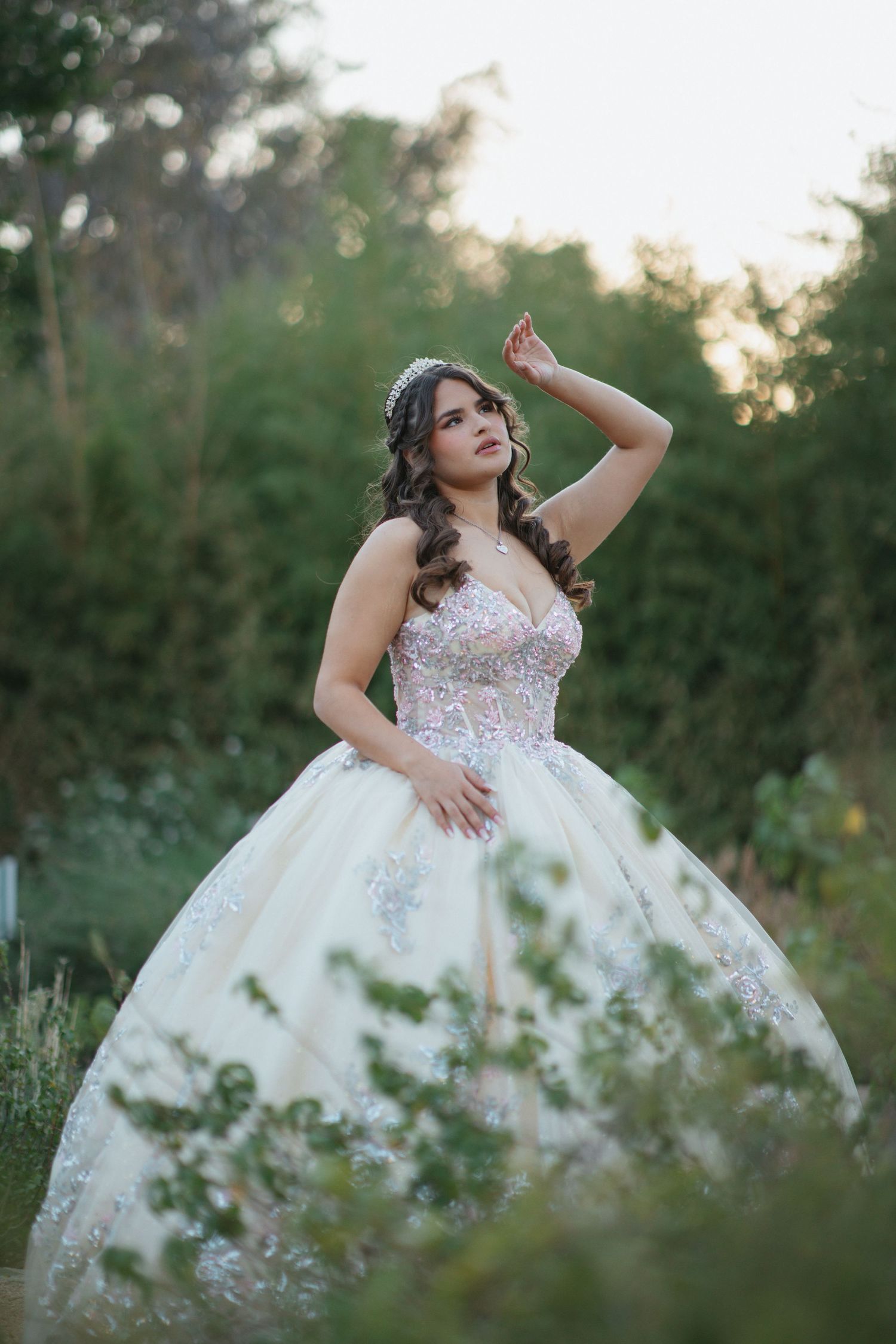 Ethereal outdoor portrait in white ballgown with pink bodice details.