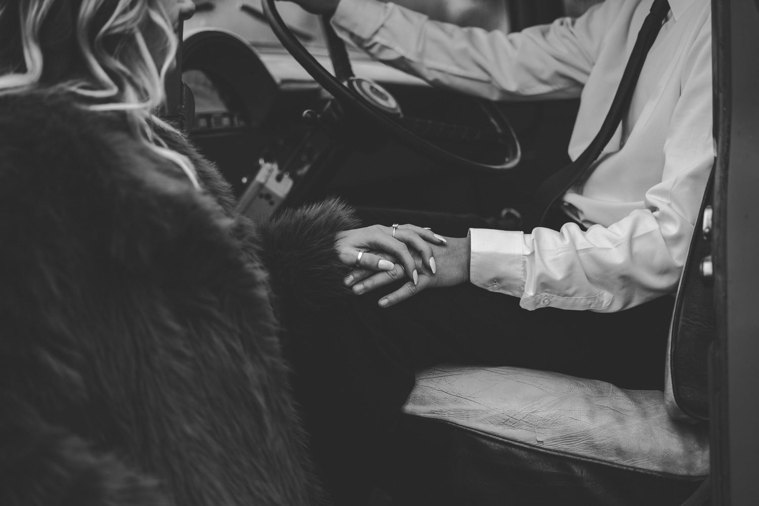 Artistic black and white composition of flowing fabric and movement.
