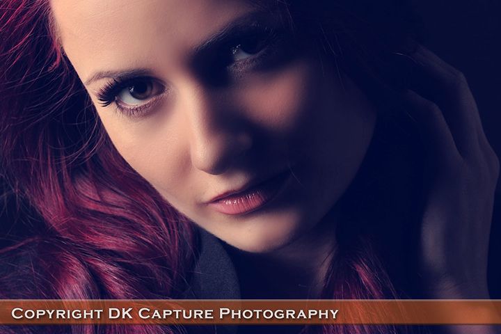 Artistic portrait photography series with dramatic purple lighting and moody shadows creating ethereal atmosphere.