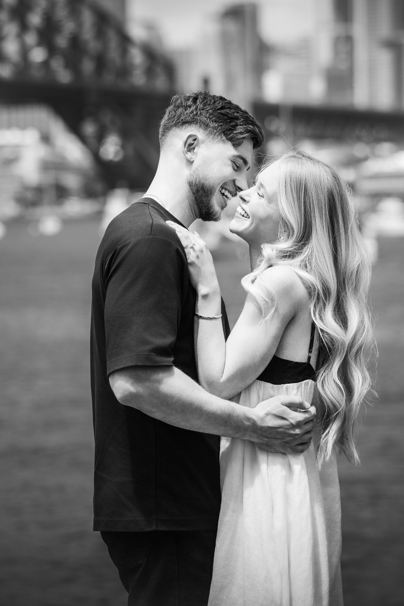 Black and white romantic couple portraits showing intimate moments outdoors.
